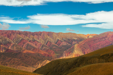 Panoramic view of the multicolored Hornacal mountains, Quebrada de Humahuaca, Argentina,