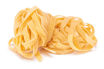 Four Classic Italian Raw Egg Fettuccine - Isolated on White Background. Dry Twisted Uncooked Pasta. Italian Culture and Cuisine. Raw Golden Macaroni Pattern - Isolation