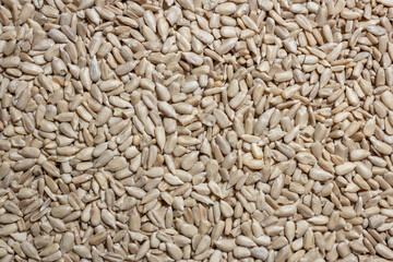 Peeled Sunflower Seeds Background: A Culinary Canvas of Shell-free Sunflower Seeds, Creating a Lively and Textured Background for Gourmet Cooking - Top View, Flat Lay