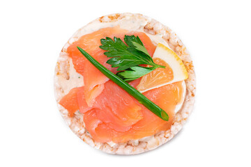 Rice Cake Sandwich with Fresh Salmon, Lemon and Greens - Isolated on White Background. Diet Food. Quick and Healthy Sandwiches. Crispbread with Fresh Fillings. Healthy Dietary Snack