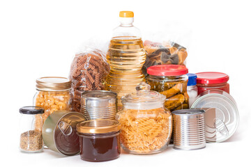 Food Reserves: Canned Food, Spaghetti, Pate, Tuna, Tomato Juice, Pasta, Fish and Grocery - Isolated on White Background. Emergency Food Storage in Case of Crisis. Strategic Food Supplies - Isolation
