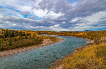 Cloudy Sky Over A Fall River Valley In Cochrane