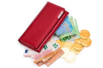 Red Leather Women Purse with Different Euro Banknotes and Bitcoin Coins - Isolated on White Background. A Wallet Full of European Union Paper Money Symbolizing Wealth and Success - Isolation