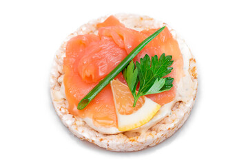 Rice Cake Sandwich with Fresh Salmon, Lemon and Greens - Isolated on White Background. Diet Food. Quick and Healthy Sandwiches. Crispbread with Fresh Fillings. Healthy Dietary Snack