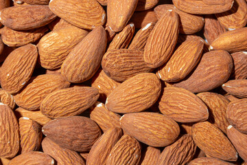 Scattered Almonds. Background from Almond Nuts. Natural High-Calorie Snacks