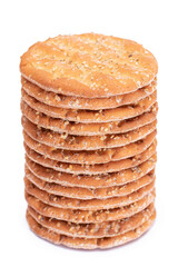 A Stack of Round Salt Crackers with Sesame Isolated on White Background. Dry Snacks - Isolation