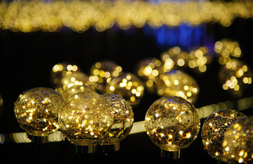 Festive lights and bokeh at outdoor festivals and festivities