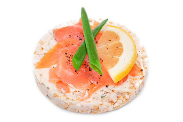 Rice Cake Sandwich with Fresh Salmon, Lemon and Green Onions - Isolated on White Background. Diet Food. Quick and Healthy Sandwiches. Crispbread with Fresh Fillings. Healthy Dietary Snack