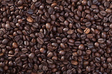 Roasted coffee beans background. High quality photo