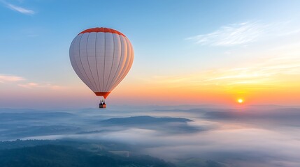 Fototapeta premium Experience the serenity of nature as a colorful hot air balloon soars at sunrise