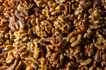 Scattered Shelled Walnuts. Background from Walnut. Natural High-Calorie Snacks