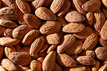 Scattered Almonds. Background from Almond Nuts. Natural High-Calorie Snacks