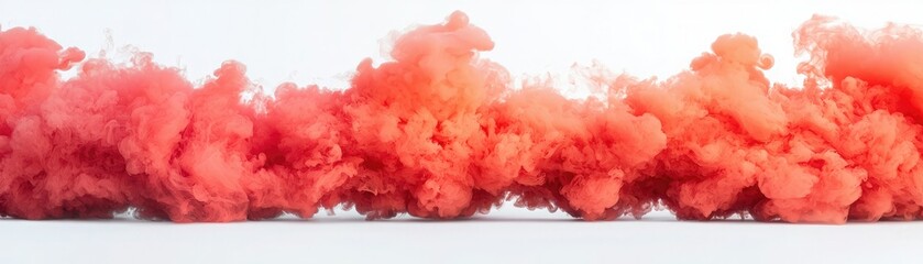 Fototapeta premium A vibrant display of red smoke creates a striking contrast against a light background, evoking a sense of drama and energy.