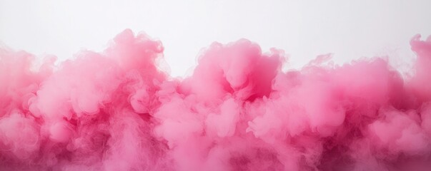 Fototapeta premium A soft, vibrant pink cloud floats against a bright backdrop, creating a dreamy and whimsical atmosphere.