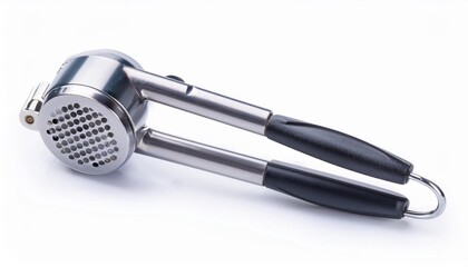 Obraz premium Garlic Press on White Background Isolated. Full Shot of Kitchen Utensils.