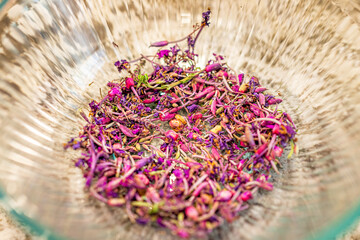 Dry willowherb herb fireweed purple flowers for tea plant called Ivan Chai in Russia with macro closeup view in bowl