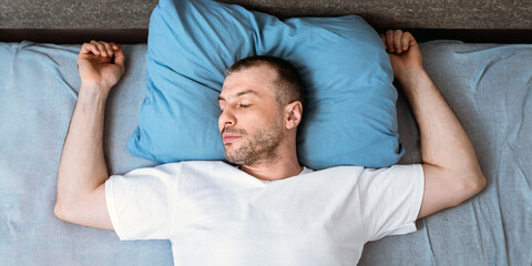 Mature Man Sleeping And Snoring Lying In Bed In Bedroom Staying At Home During Covid-19 Quarantine....