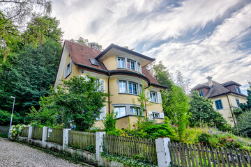 europe,architecture,cityscape,travel,tourism,tourist,old town,shopping,finance,clock tower,river,botanical garden,water,promenade,luxury,design,art,viewpoint,pedestrian,zurich,lake zurich,bahnhofstras