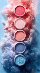 Colorful Powders on Soft Blue Background