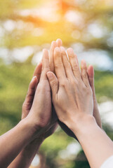 Vertical Horizon Group of teamwork high five team together hands raise up power partner. Diversity...