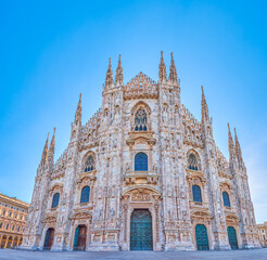 Fototapeta premium Marble facade of Milan Duomo, the main landmark of the city, Milan, Italy
