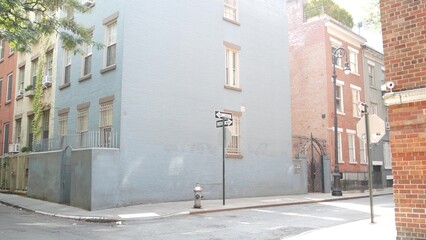 New York City oneway crossroad, Minetta street intersection one way arrow road sign. Manhattan...