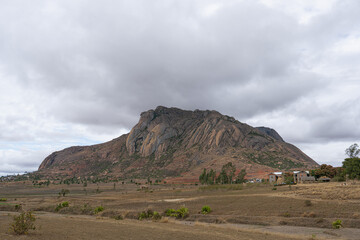 A stunning view of the rugged terrain and unique rock formations of Isalo National Park. The park's geological formations date back to the Jurassic period. Isalo National Park, Madagascar.