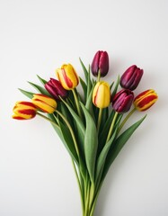 Naklejka premium Bouquet of red tulips on a white background