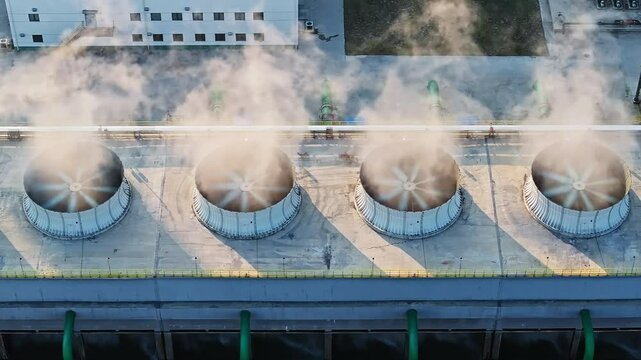 Aerial view of industrial exhaust fans at sunrise