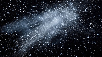 Obraz premium Christmas snow spray frame featuring scattered snowflakes isolated on a dark background resembling a snow explosion or ice storm