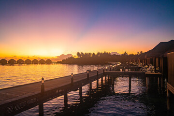 Fototapeta premium Sunset views from overwater pool villa in Maldives