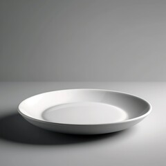 A 3D-rendered plain white ceramic plate with smooth edges, placed on a clean, white background with minimal lighting and shadows for a minimalist look.