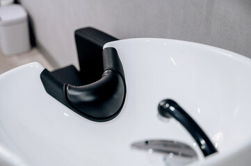 white hair wash sink in beauty salon workplace
