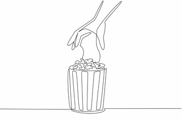 Happy National Popcorn Day. Single continuous line drawing of person hand picking caramel flavor popcorn up from stripped pop corn paper bucket. Food snack concept. One line draw vector illustration