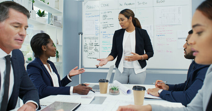 Presentation, planning and idea with business woman in meeting for strategy, brainstorming and teamwork. Proposal, budget and project management with people in office for progress report and research