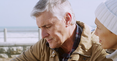 Senior people, sad and thinking at ocean with depression, sadness and emotional support for loss....