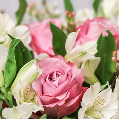 Fototapeta premium Pink rose in flower arrangement. Decoration roses and ornamental plants
