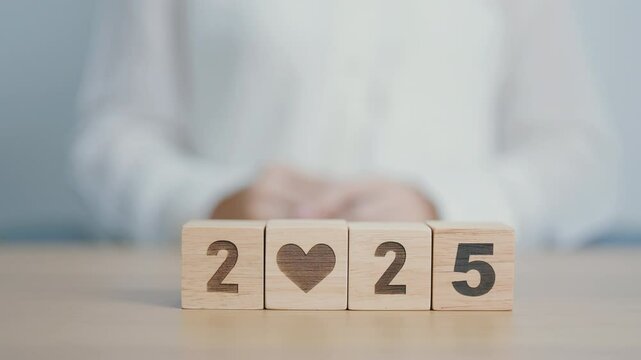 Happy New Year 2025 with heart block for health care, love, organ donation, resolution, charity, happy family, wellbeing and insurance concepts