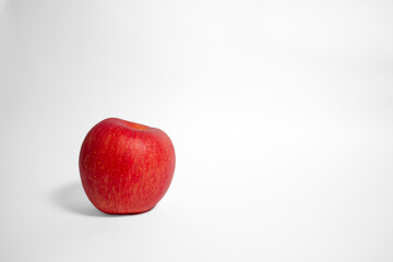 Red apple on isolated white background