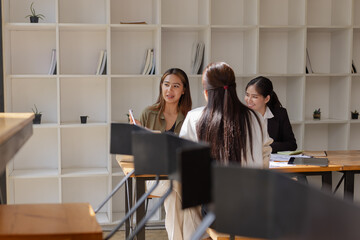 Asian businesswoman teamwork working on laptop with finances analysis report at desk in office, business financing, accounting banking, Team of creative and business planning, 