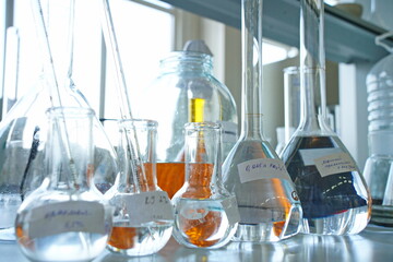 Almaty, Kazakhstan - 03.26.2024 : Flasks for checking the quality of bottled water. Samal Factory