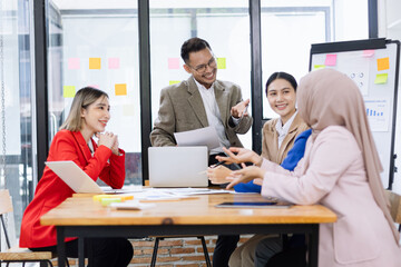 Fototapeta premium Team of asian business working with finances analysis report meeting in office, business financing, accounting banking, Business teamwork, Team of creative asian business meeting and business planning