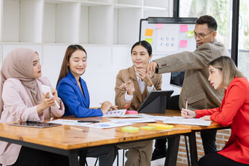 Fototapeta premium Team of asian business working with finances analysis report meeting in office, business financing, accounting banking, Business teamwork, Team of creative asian business meeting and business planning