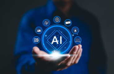Artificial Intelligence (AI) and Business Support Concept. A person holds AI icons, data...