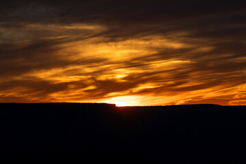 Golden hour, fire sunset sky at Grand Canyon National Park, Arizona. High quality picture for download.