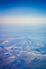 Greenlandic ice cap with frozen mountains and fjord aerial view