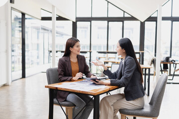 Two businesswoman working with analysis data investment plan, Business startup and marketing presentation,