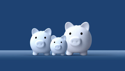 Three piggy bank family isolated on wooden table and blue background. Saving investment budget wealth business retirement, financial, money, banking concept