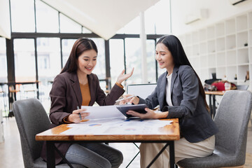 Two businesswoman working with analysis data investment plan, Business startup and marketing presentation,