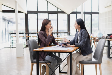 Two businesswoman working with analysis data investment plan, Business startup and marketing presentation,